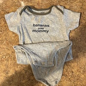 Grey Carter’s baby body suit